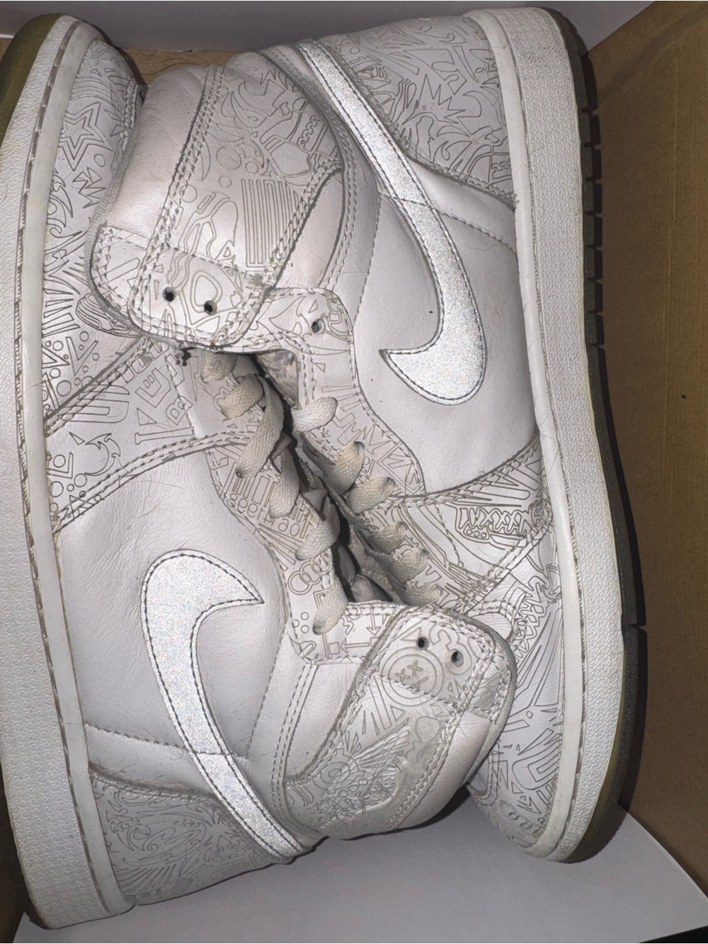 Nike White High-Top Sneakers with Etched Graphic Panels